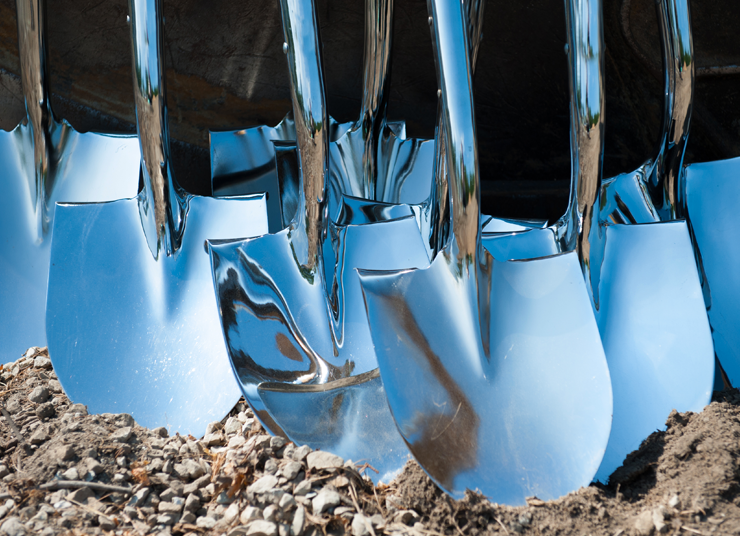 Silver shovels lined up