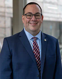Image of man with glasses